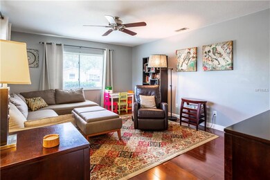 Living Room with Wood Floor and Bathed in Natural Light