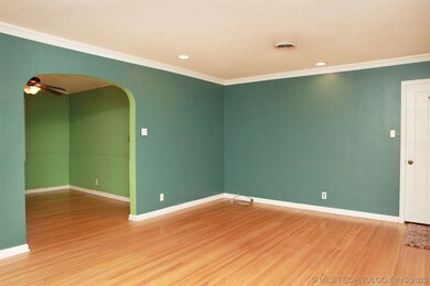 Family room opens up to the formal dining room