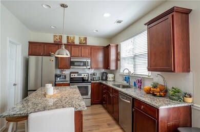 Kitchen with appliances with stainless steel finis