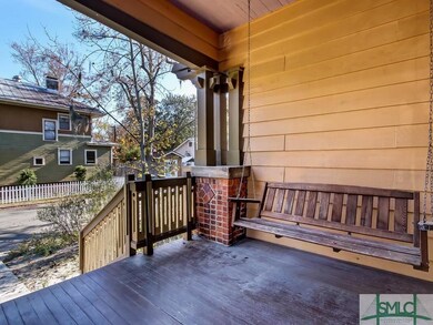 Deep front porch with swing