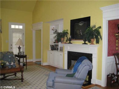 Living Room - Bright 2-story living room with fire