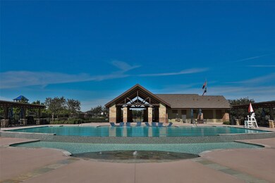 The community pool is relaxing and spacious.  Enjoyment and sunshine are the order of the day. Spend the day swimming, lounging and enjoying this wonderful area. Perfect home and community for a STAYcation.