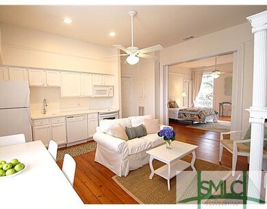 Living Room. All-white decor brings fresh modern a