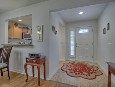 Front door has decorative glass insert and sidelig