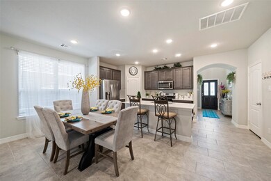 Kitchen and breakfast/dining are just off entryway