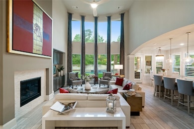 This photo showcases a spacious, elegant living ar