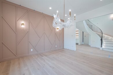Elegant dining room with statement chandelier and