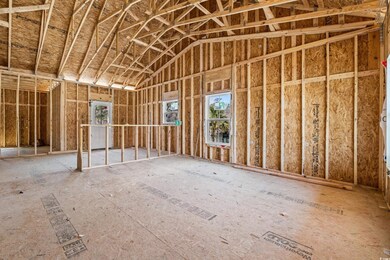 Misc room with vaulted ceiling