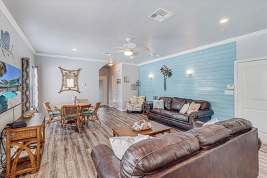 Lovely accent wall and great space in the living a