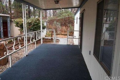 LONG COVERED FRONT PORCH
