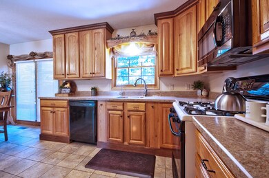 Kitchen Sink Overlooks Pool & Backyard