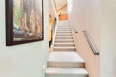 Custom skylight spans entire length of stairway, b