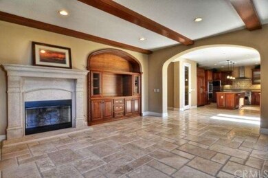 A stone fire place, wood beans and entertainment c