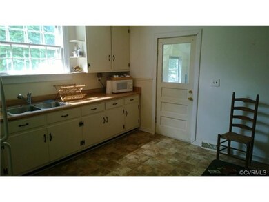 Kitchen opens to laundry and mud room.