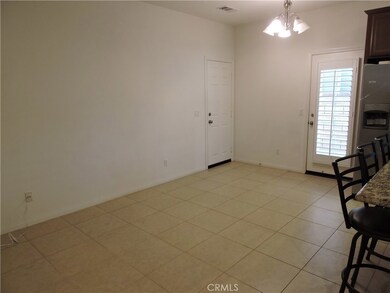 Family room. Doors to garage and side yard.