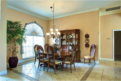 Listello border in tile to define dining area