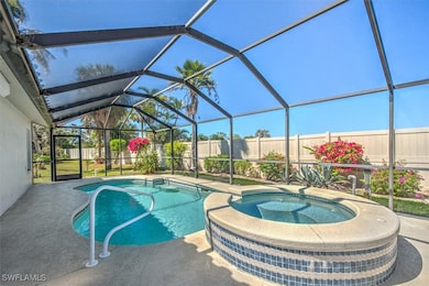 View of pool with a patio area, a fenced backyard,