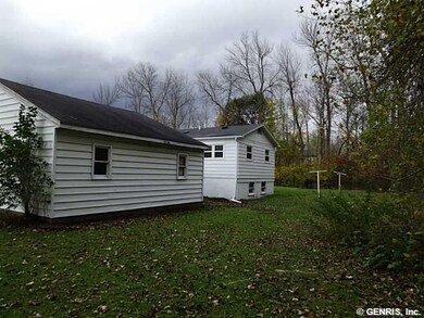 Exterior Back. Rear of the home and garage.