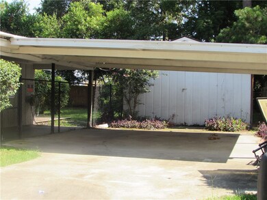 The double carport attached will keep you out of t