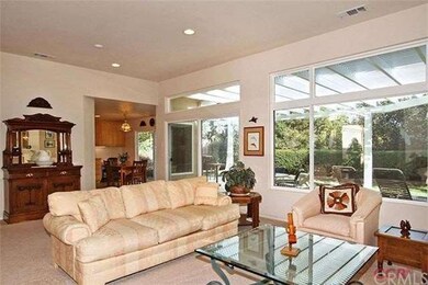 Living Room is adjacent to the patio for indoor/ou