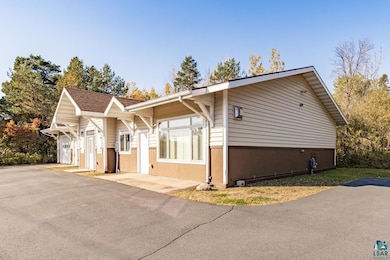 View of front of house featuring stucco siding