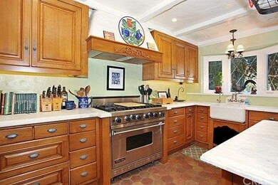Chef's kitchen with Viking range and marble counte
