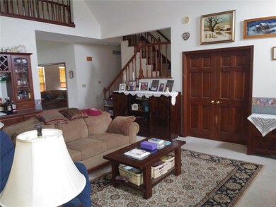 Double door entrance to office/den from family roo