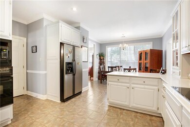 White Quartz Counters, Wood Cabinets, Breakfast Ba