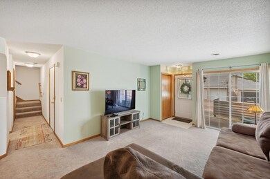 Wonderful layout and open living space with sliding doors to patio!