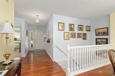 Foyer and stars leading to lower level