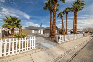 Ranch-style home featuring a fenced front yard and