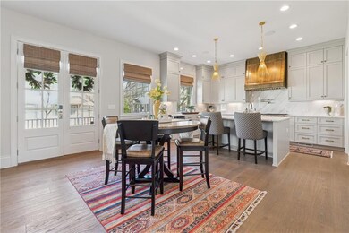 Dining room featuring wood finished floors and rec
