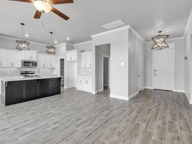Kitchen featuring appliances with stainless steel 
