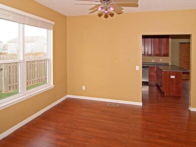 Dining Room. A bright and sunny dining space just off the kitchen makes entertaining a breeze!  The 9 foot ceilings in this home and the open concept plan really make this home feel extra spacious...