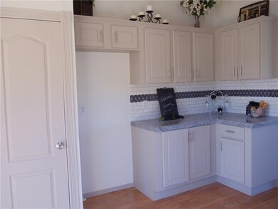 Another view of kitchen with pantry.
