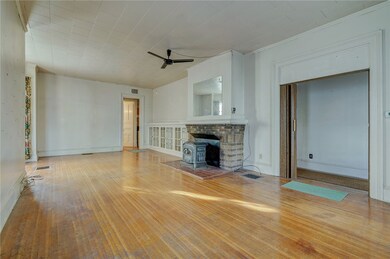 LIV/DIN WITH HARDWOODS & WOODSTOVE