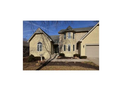 Loads of curb appeal and well landscaped.