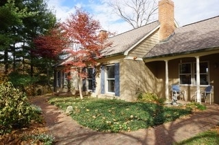 Brick walkway leading to the front door.