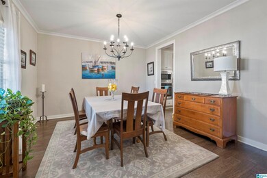 Just off the kitchen this dining room is the perfe
