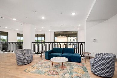 Living room with light wood-type flooring