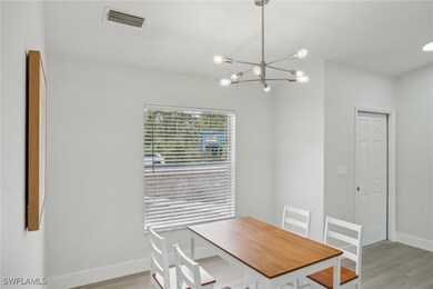Unfurnished dining area with baseboards, visible v