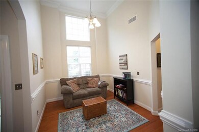Light & Bright Formal Dining Room with chair rail.