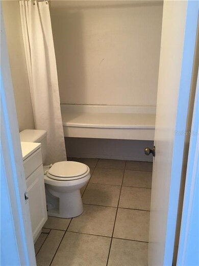 Half bath in the lower level with storage area