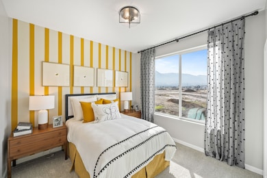 Bedroom featuring carpet floors, a mountain view, and wallpapered walls