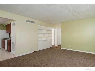 Living Room. Moveable bookcase wall slides back an