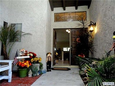 Private gated courtyard entry, notice the leaded g