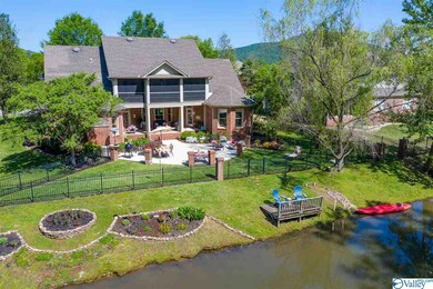 Great back yard for entertaining, with screened in second floor porch, large first floor porch, and  extended patio.