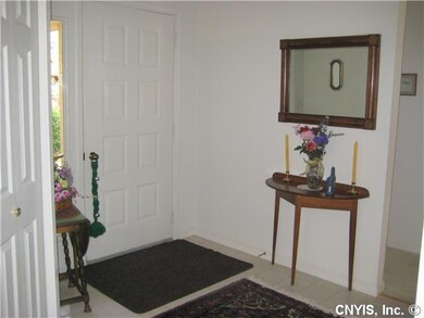 Foyer. Another view of entryway.