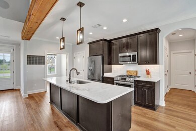 Kitchen featuring stainless steel appliances, ligh
