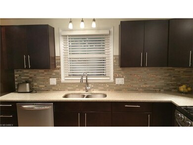 Updated eat in kitchen with stainless steel applia